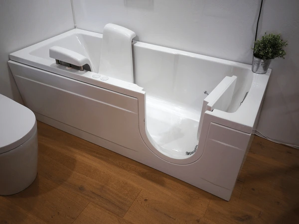 Walk-in bathtub installation in Nashua, NH with built-in seating and safety features